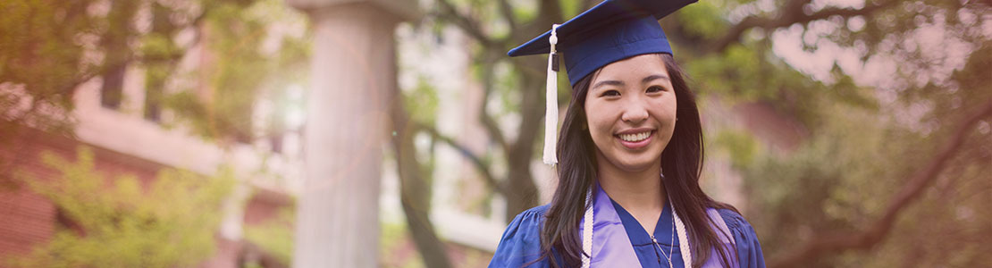 Female graduate in cap and gown