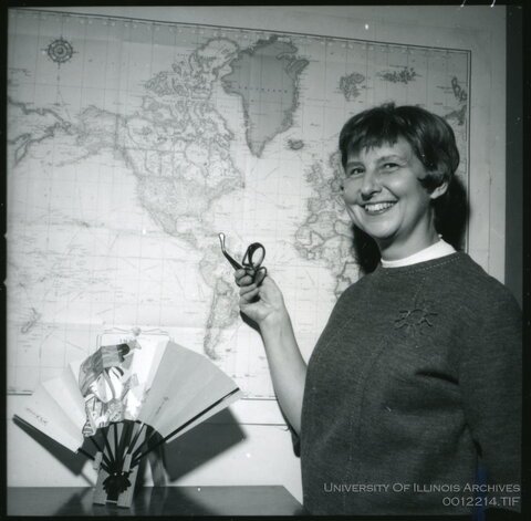 Katharine Aston in front of a map