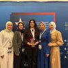Debate Champion Foziea Garada next to her coach Dr. Eman Saadah holding her first place award at the U.S. Arabic Debate Championship