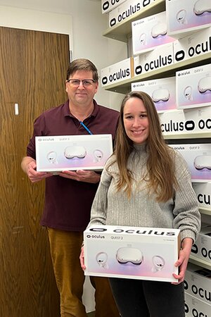 photo of Randall Sadler and Tricia Thrasher with Meta's VR headsets
