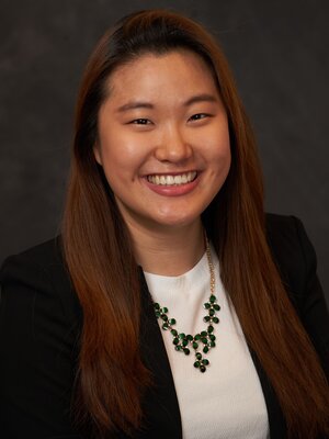 portrait photo of Katherine Kwak against a grey background