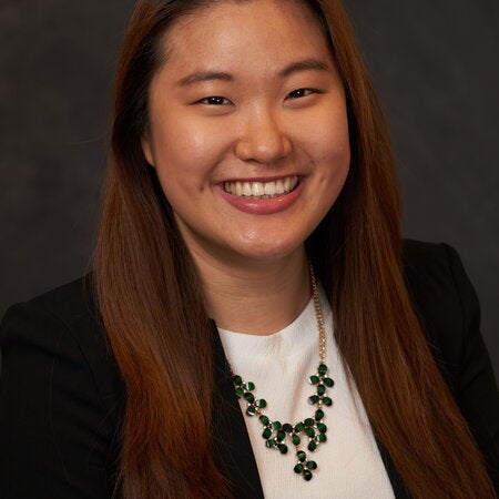 portrait photo of Katherine Kwak against a grey background